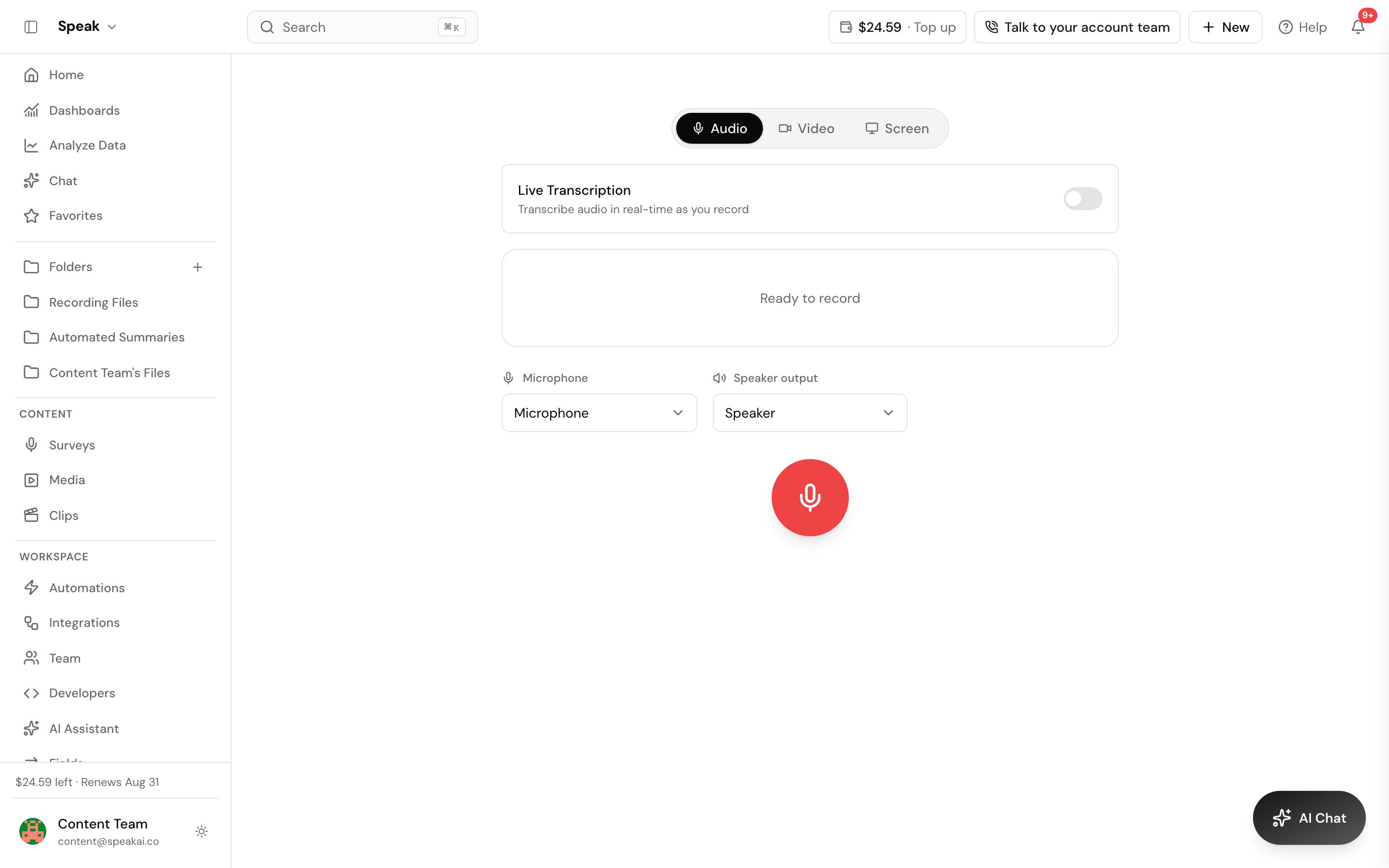 The in-browser recorder. Audio, Video and Screen tabs sit at the top with Audio selected, a Live Transcription toggle is switched off below them, the panel reads Ready to record, and microphone and speaker pickers sit above a large red record button.